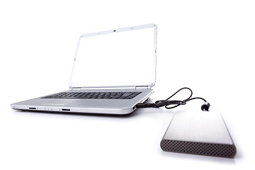 Image showing laptop and a external disk