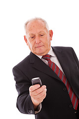 Image showing Senior sending a sms