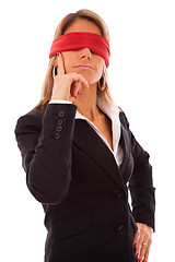 Image showing blindfold businesswoman thinking