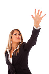 Image showing Businesswoman reaching something