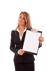 Image showing businesswoman holding a clipboard