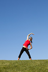 Image showing woman doing exercise outdoor