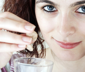 Image showing Young people eating milk with cereals