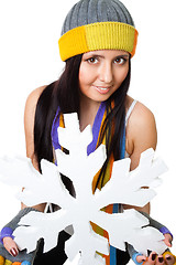 Image showing Woman hold huge snowflake