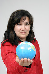 Image showing young pretty woman with Earth