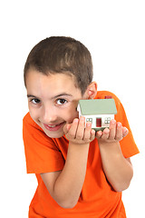 Image showing boy holdind a toy house