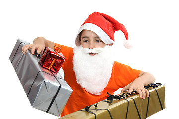 Image showing boy with large present at christmas time