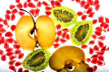 Image showing beautiful pomegranate grains, kiwi and tasty apple 