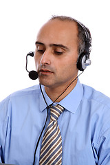 Image showing man in a business call center