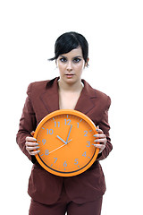 Image showing sexy businesswoman with clock, business photo