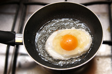 Image showing beautiful and tasty Fried egg in a frying pan