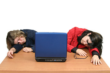 Image showing young woman dreaming on laptop