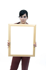 Image showing Young woman holding blank board