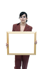 Image showing Young woman holding blank board