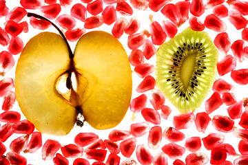 Image showing beautiful pomegranate grains, kiwi and tasty apple 