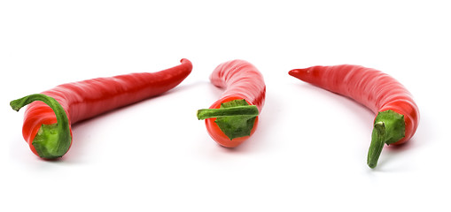 Image showing three red chili peppers