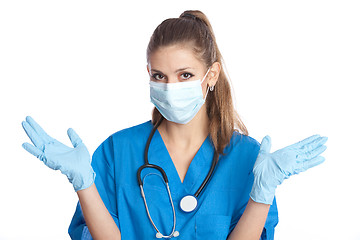 Image showing medical doctor throws up her hands