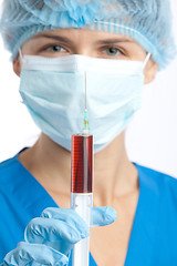 Image showing physician with syringe