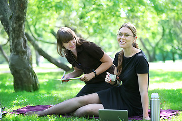 Image showing two young woman laughing