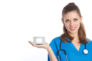 Image showing smiling physician with box