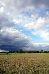 Image showing Storm clouds over the field