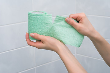 Image showing Toilet paper tearing