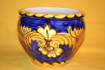Image showing Clay-pot in  blue and yellow