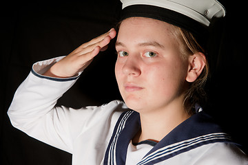 Image showing young sailor saluting isolated white background