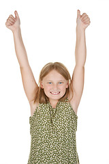 Image showing young girl happy arms raised