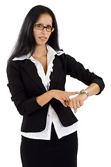 Image showing pretty businesswoman pointing on watch