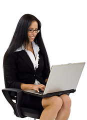 Image showing businesswoman in chair with laptop computer 