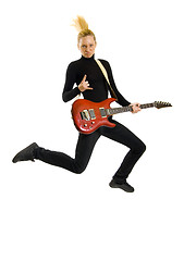 Image showing headbanging woman guitarist jumps