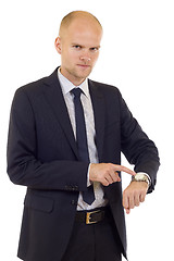 Image showing handsome businessman showing time on his watch