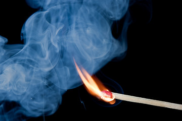 Image showing Burning match