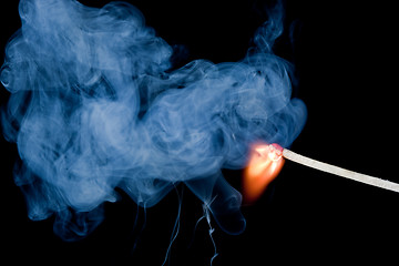 Image showing Burning match