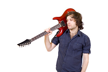 Image showing guitarist with his guitar on shoulder