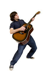 Image showing man playing his acoustic guitar
