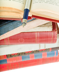 Image showing old books and pen