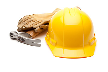 Image showing Yellow Hard Hat, Gloves and Hammer on White