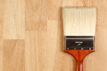 Image showing Paint Brush on Wood Surface