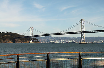 Image showing View of island and a bridge from pier