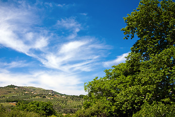 Image showing Green hill, blue sky