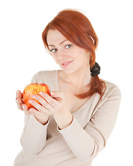 Image showing redhead girl with apple