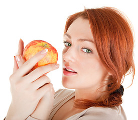 Image showing redhead girl with apple