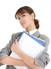 Image showing young girl in office clouses