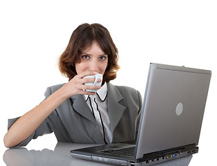 Image showing young girl in office clouses