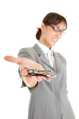 Image showing young business girl with keys