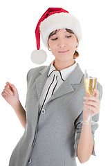 Image showing business girl in Santa hat and with champagne