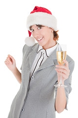 Image showing business girl in Santa hat and with champagne