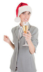 Image showing business girl in Santa hat and with champagne